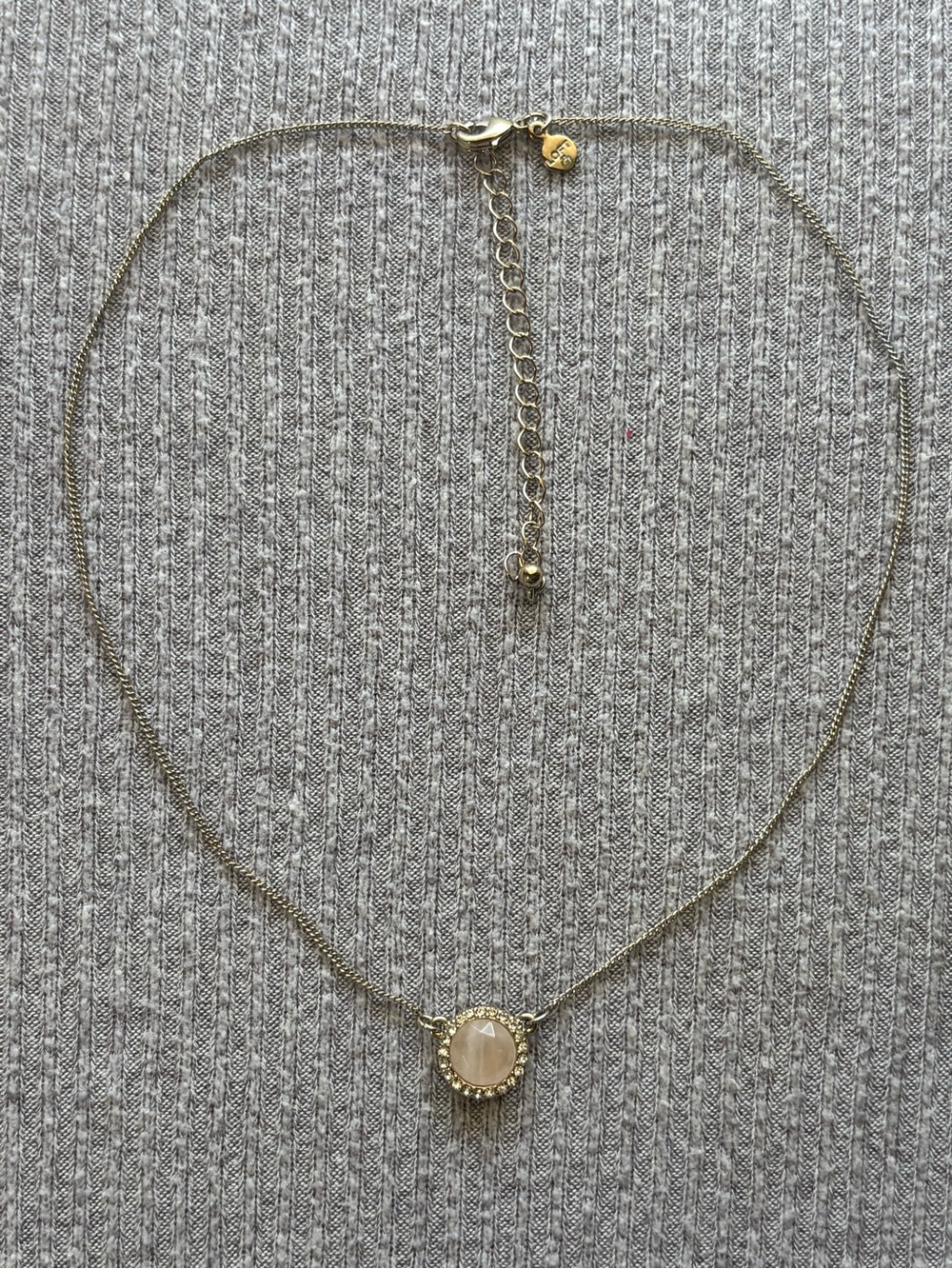 Vintage LOFT signed gold tone round rhinestone studded peach moonstone necklace